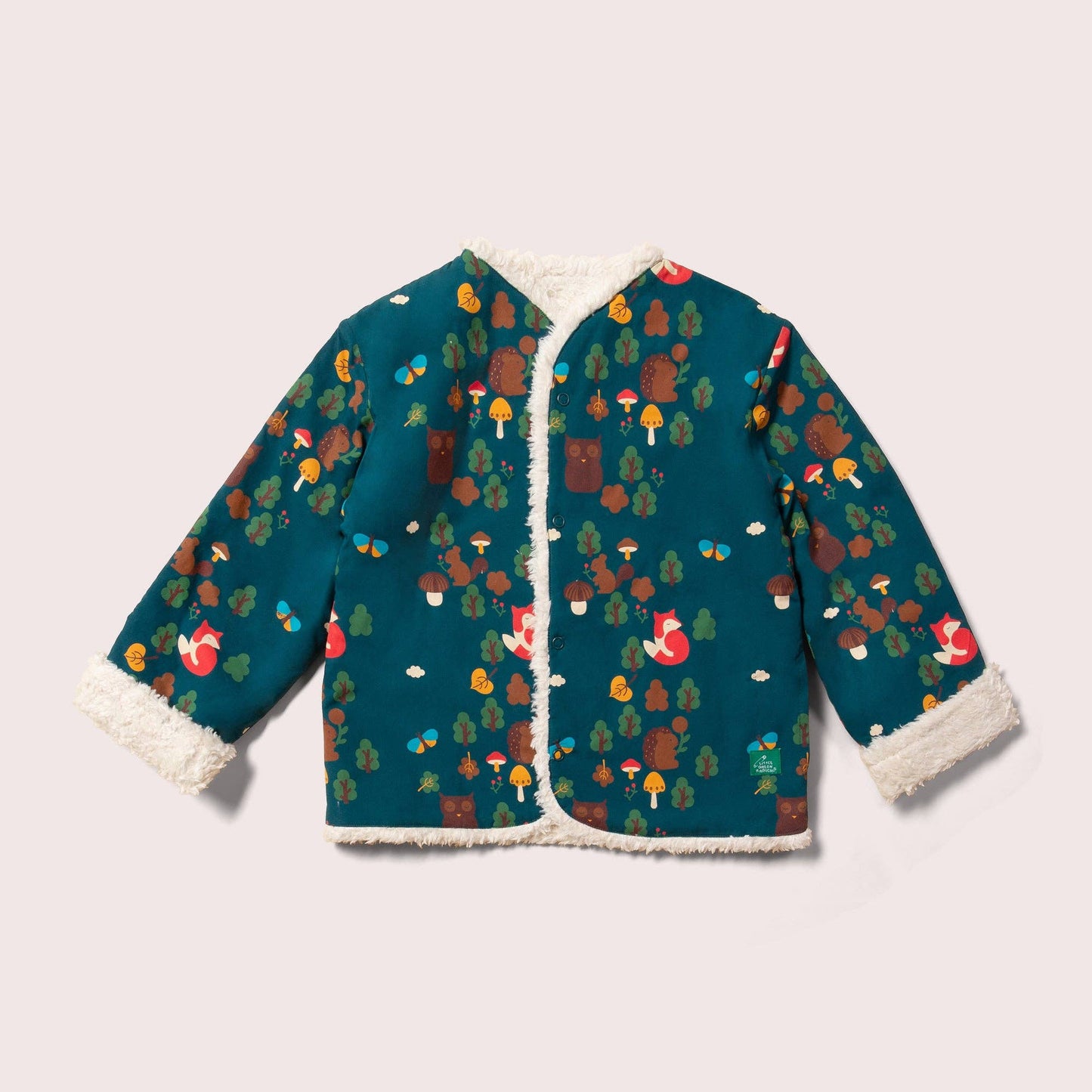 Enchanted forest reversible jacket flat lay