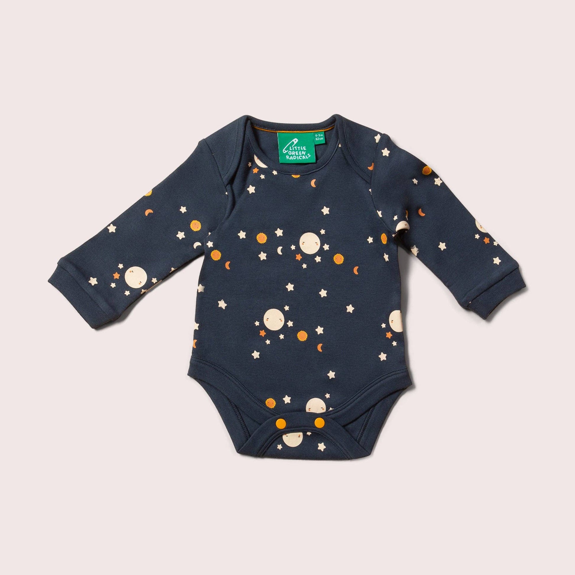 Over the moon organic onesie flat lay