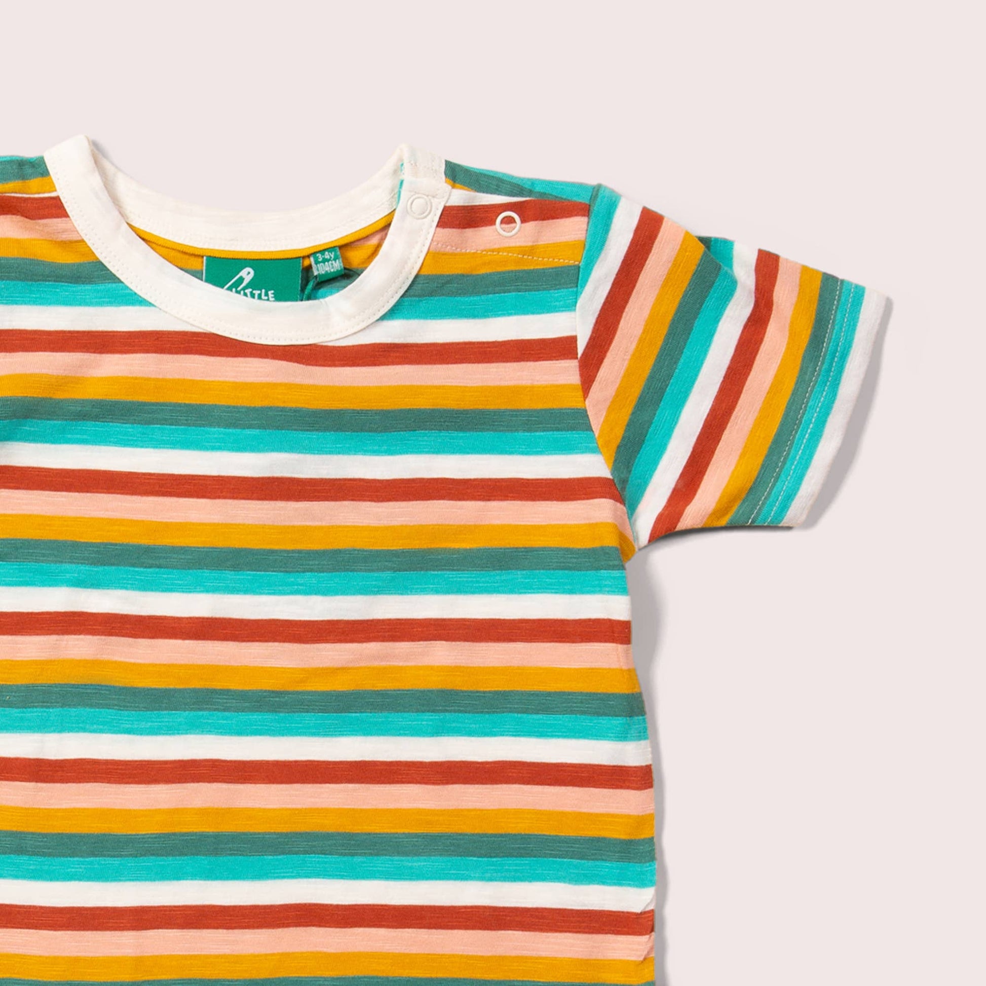 shoulder snaps detail for organic rainbow striped short sleeve tee