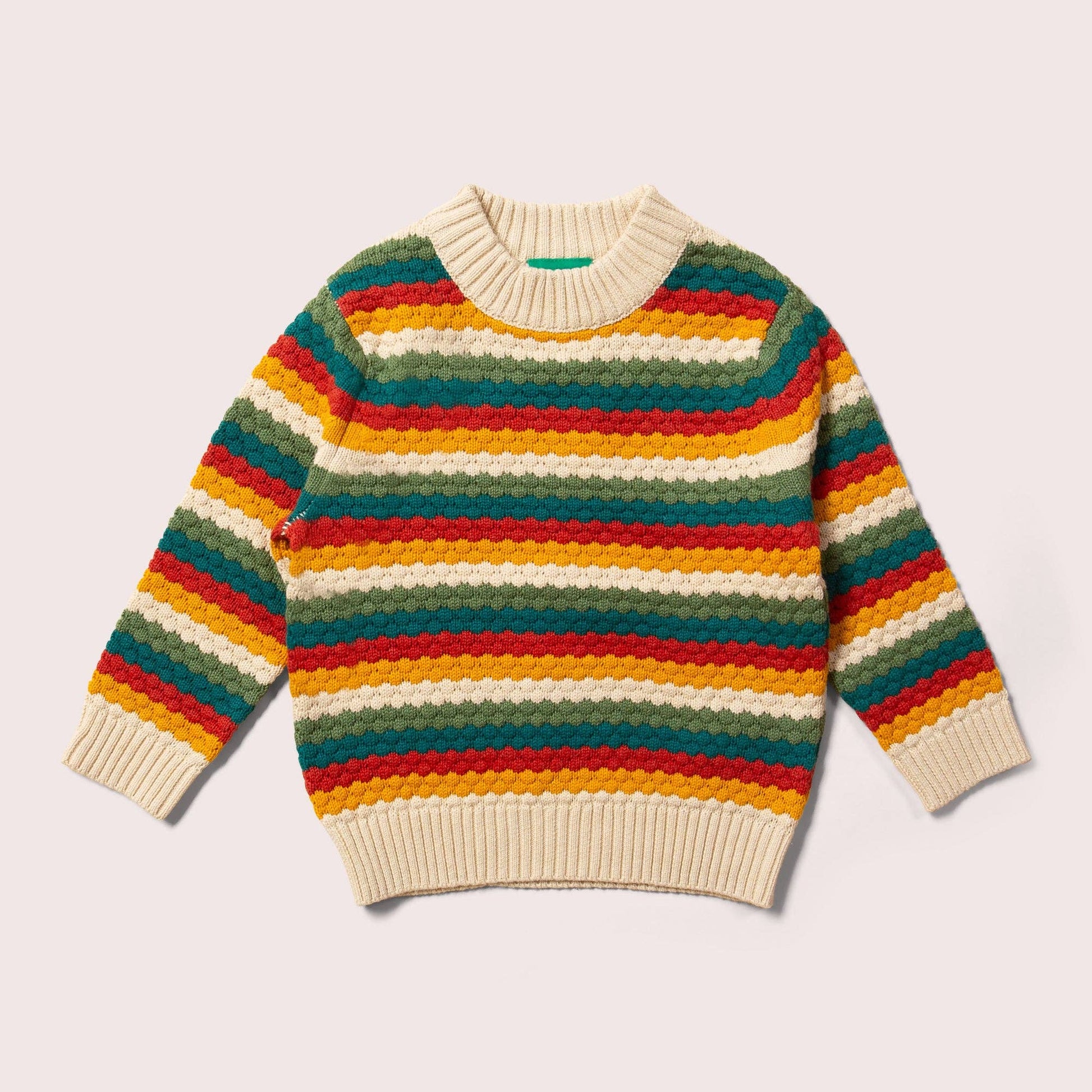 Rainbow stripe organic knitted sweater flat lay