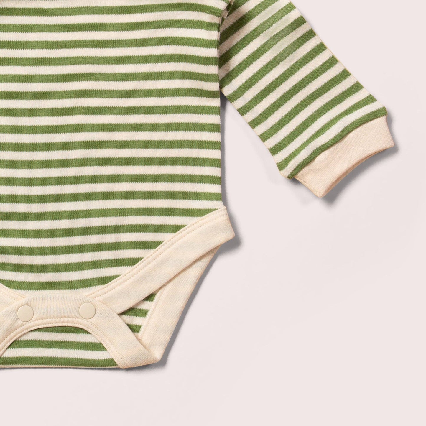 Sleeve detail for organic green stripe onesie