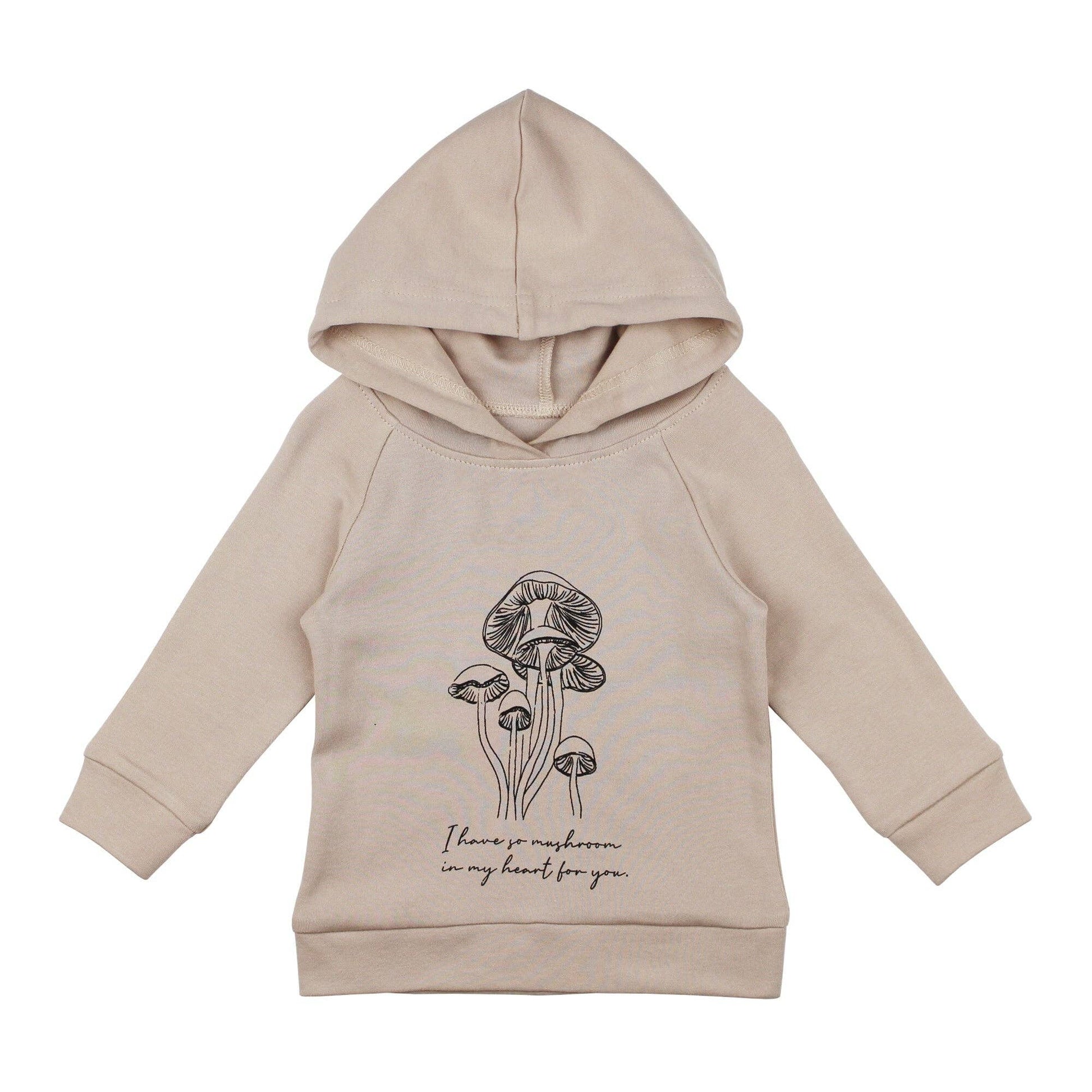 Beige hoodie with mushroom design and text on a white background