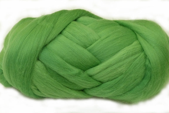 Asparagus merino wool roving on a white background