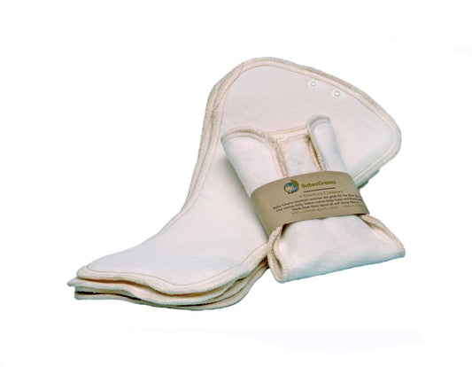 Set of white cloth pads with a brown bandage on a white background
