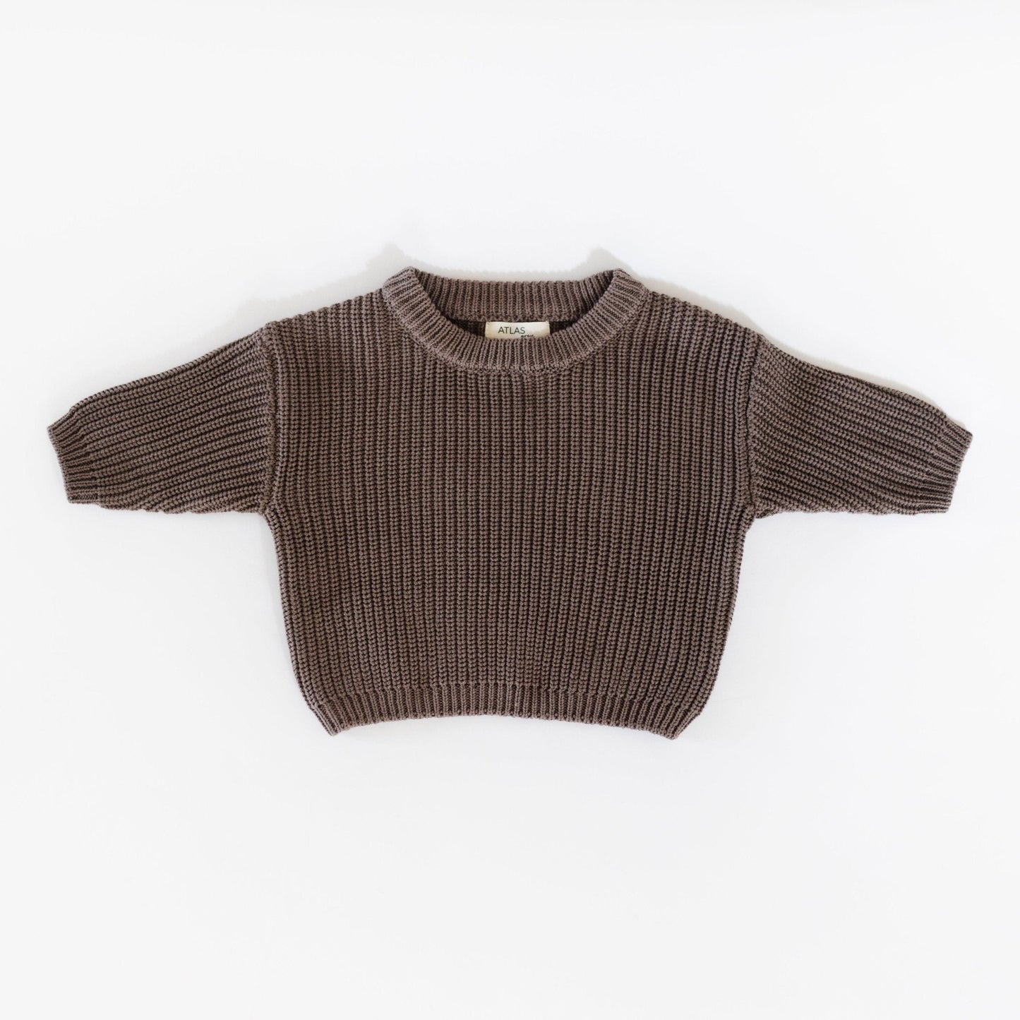 Brown knitted sweater on a white background