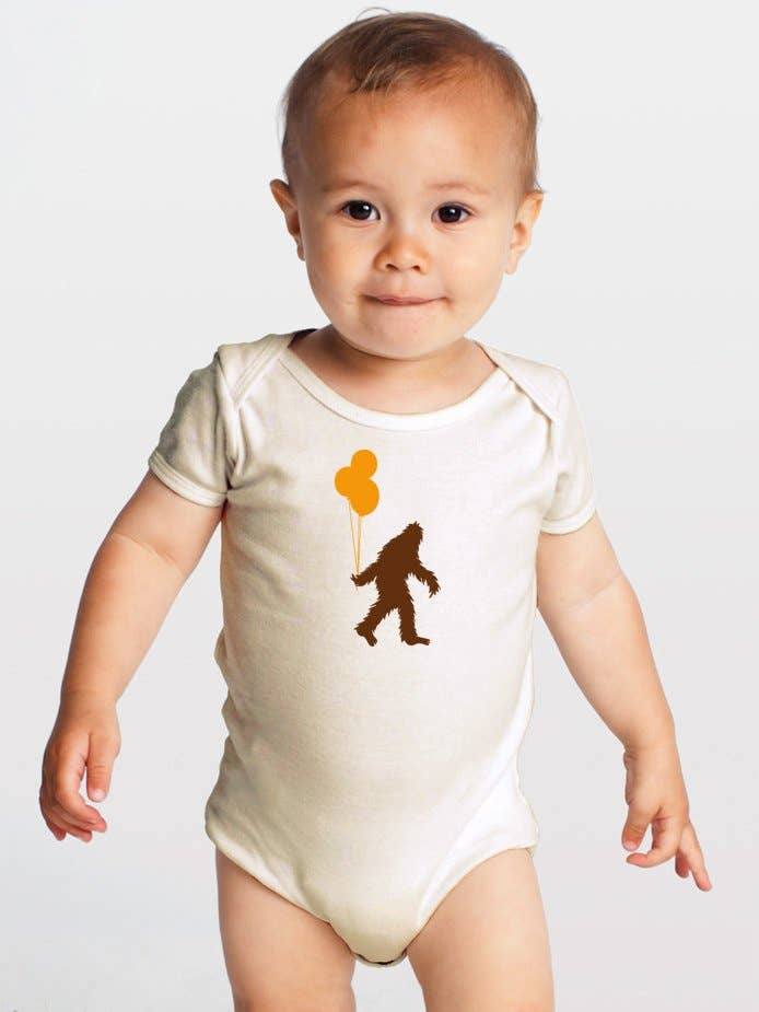 Baby wearing Sasquatch and balloons onesie