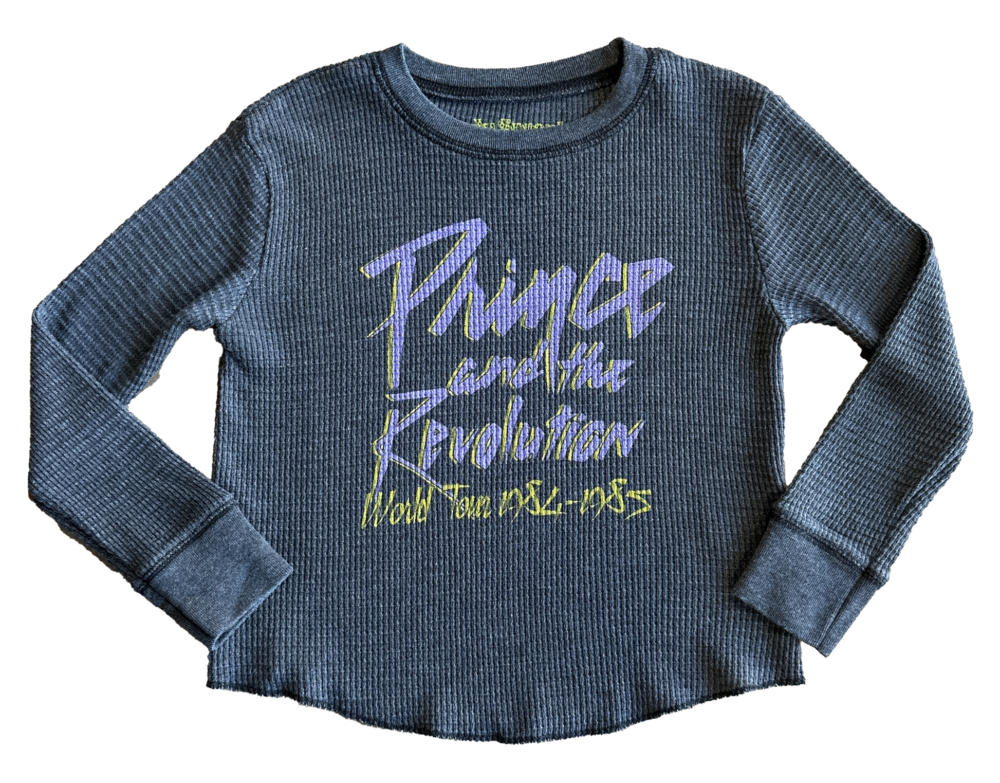 Blue long-sleeve shirt with 'Prince and the Revolution' text on a white background
