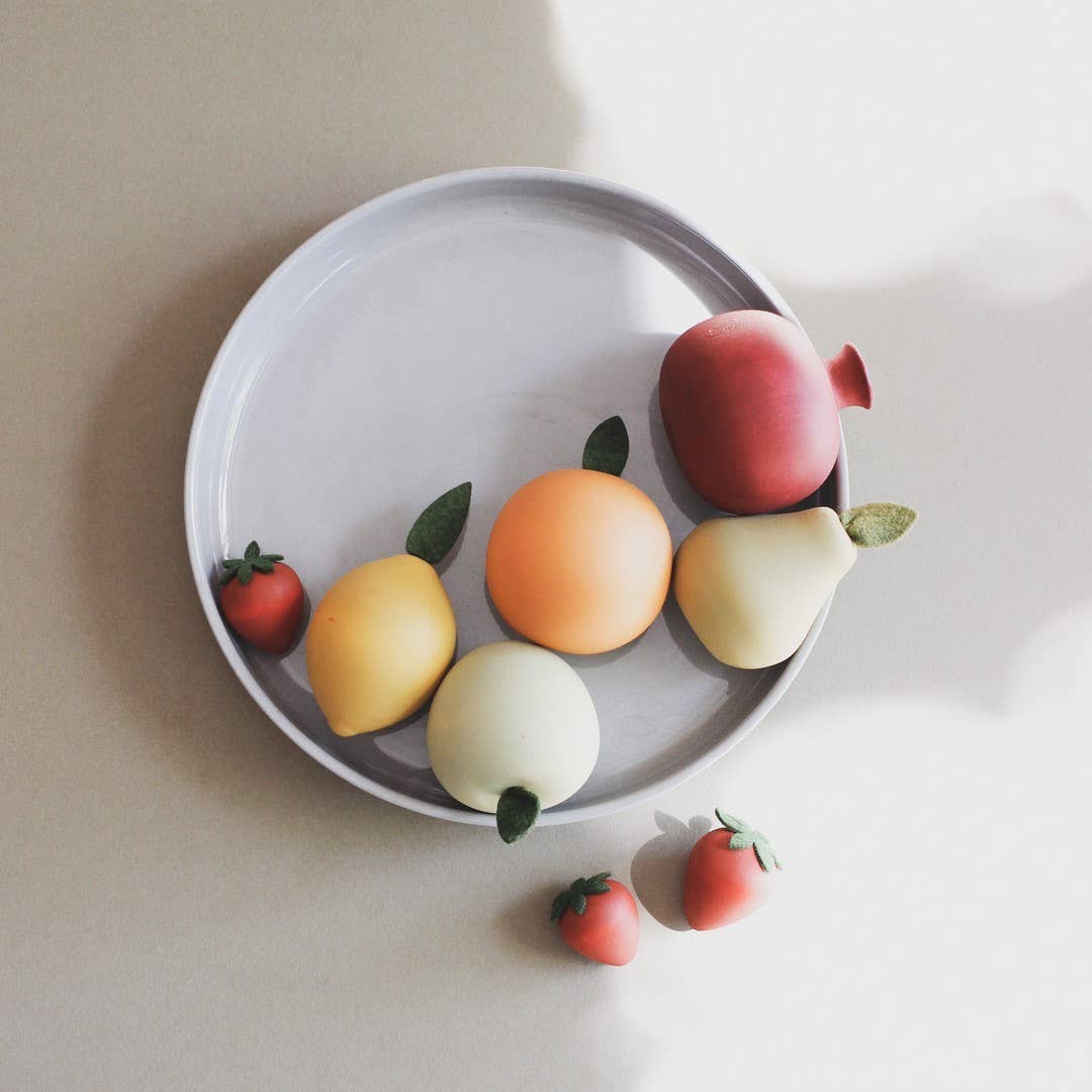 wooden mini fruit set on a plate