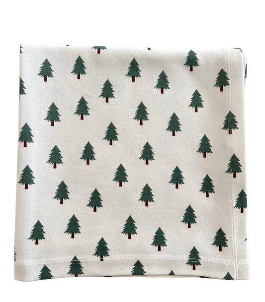 Blanket with green tree pattern on a white background