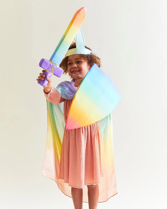 Child Wearing a rainbow knight costume