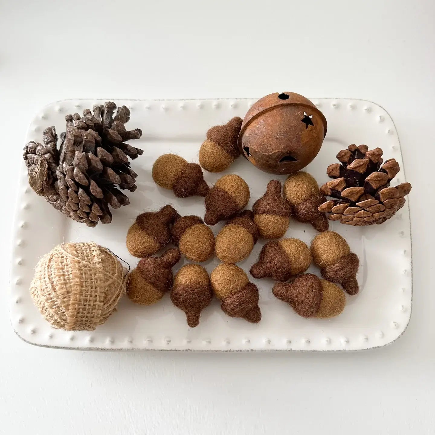 Decor tray with pinecones and brown felt acorns