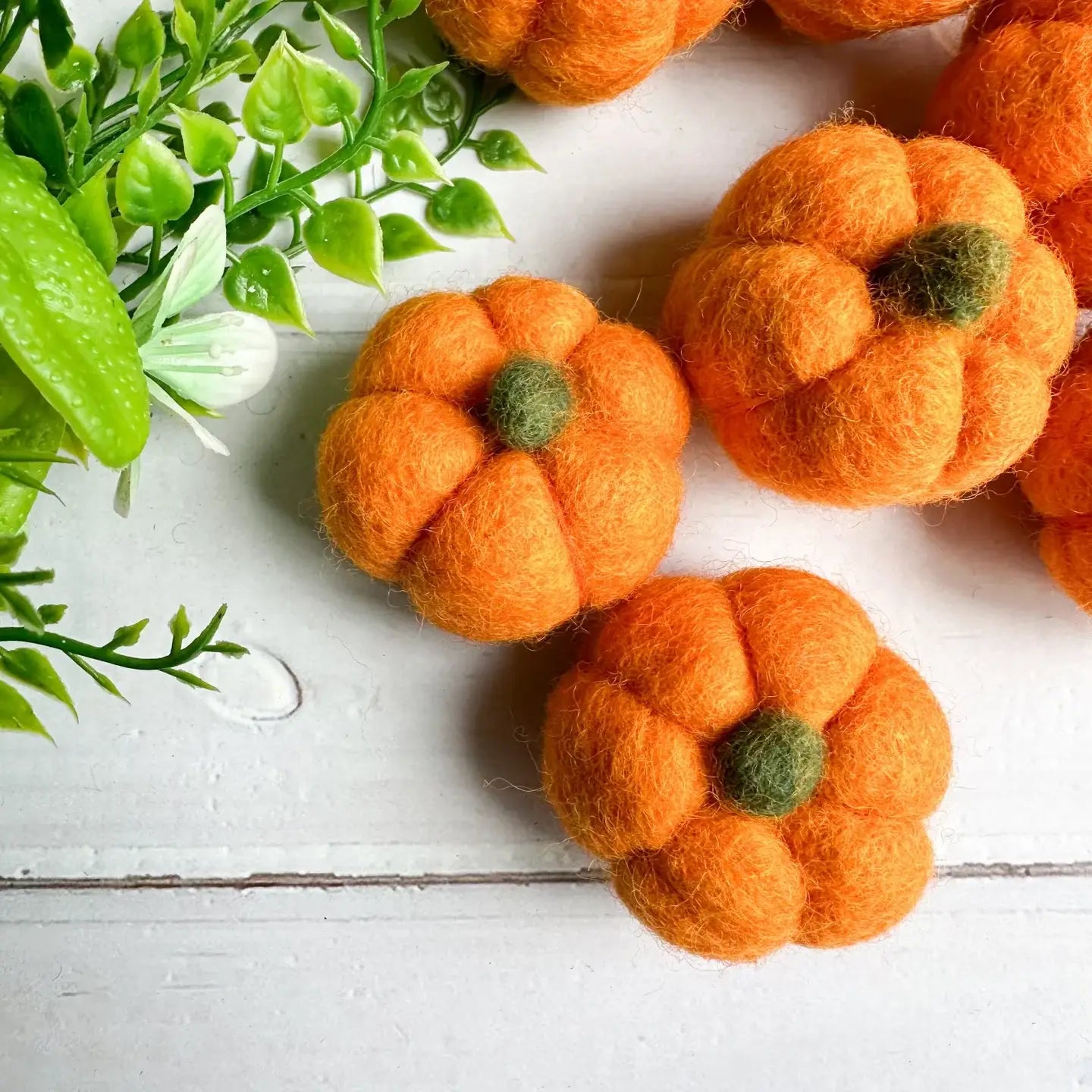 Set of orange felt pumpkins