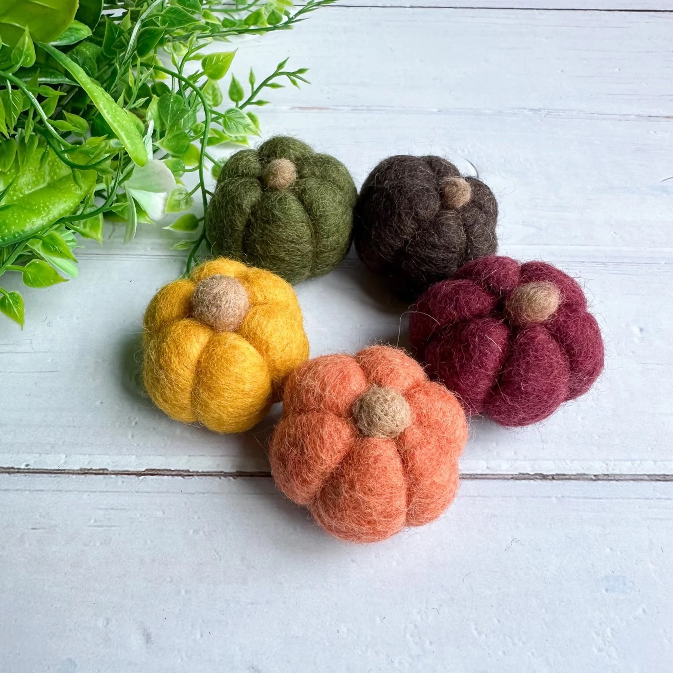 Set of felt pumpkins in fall colors