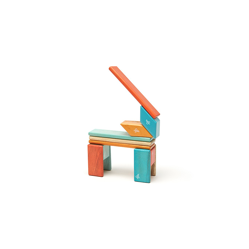 Colorful wooden toy blocks on a white background