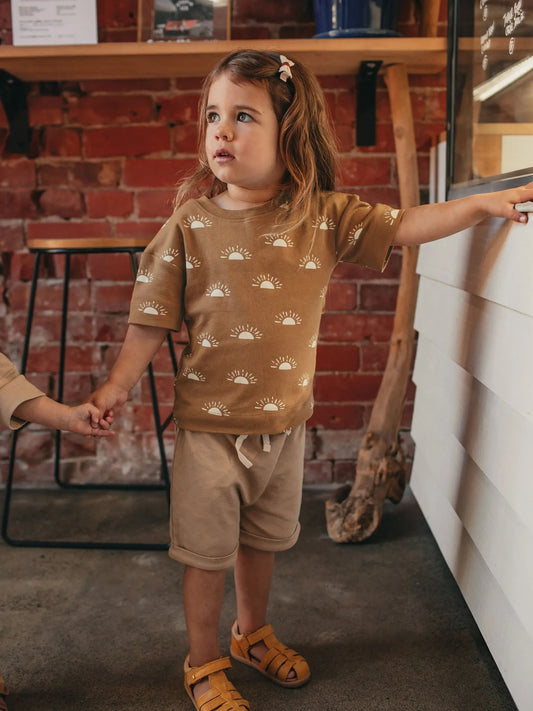 Child wearing a Golden Sun Organic Short-Sleeve Tee