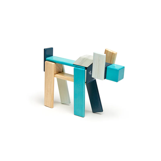 tegu 24-piece magnetic set in blues shaped like a dog