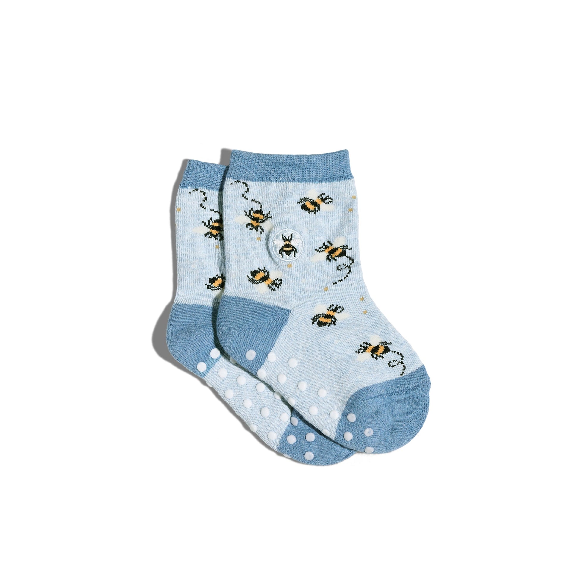 Pair of blue socks with bee pattern on a white background
