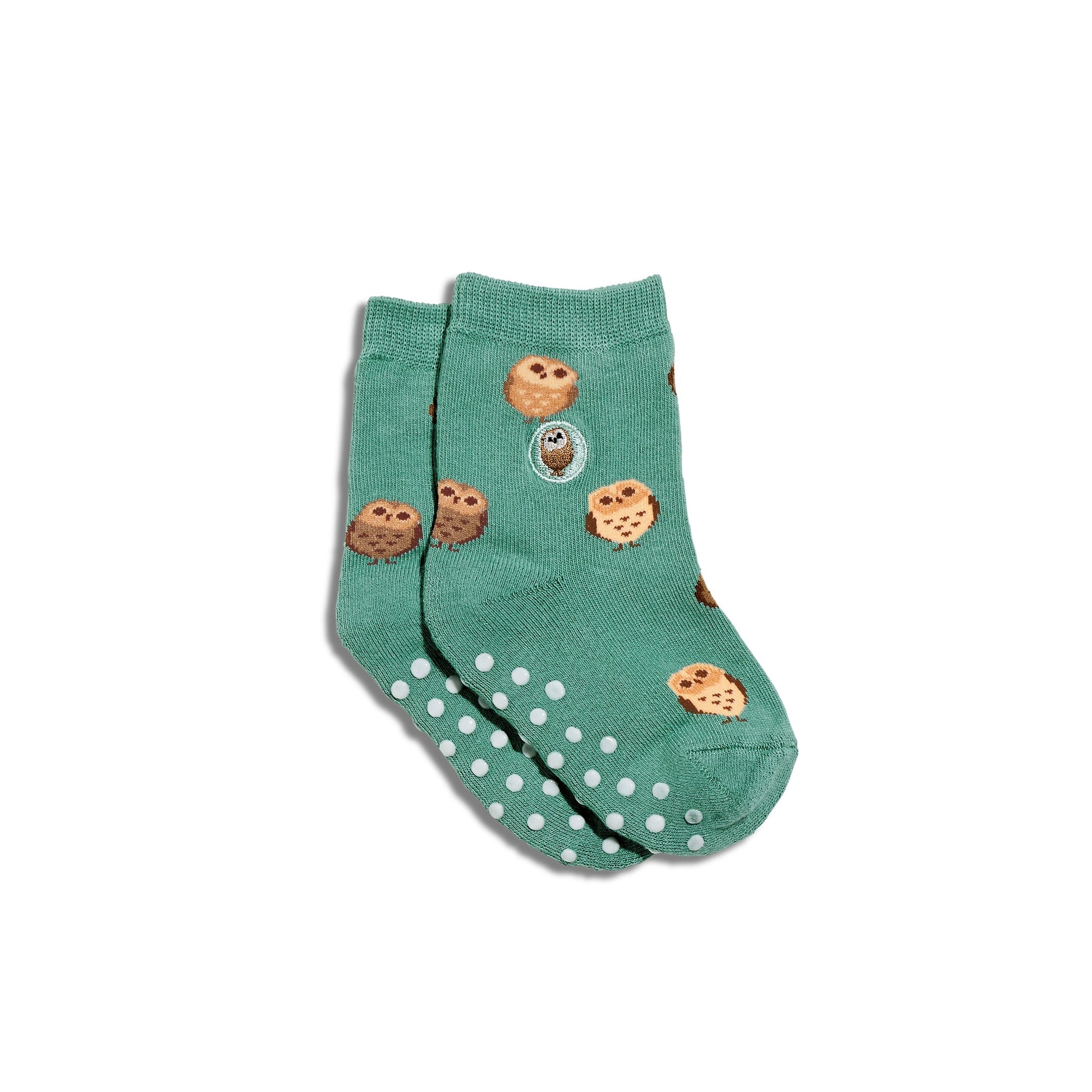 Green socks with cookie design on a white background
