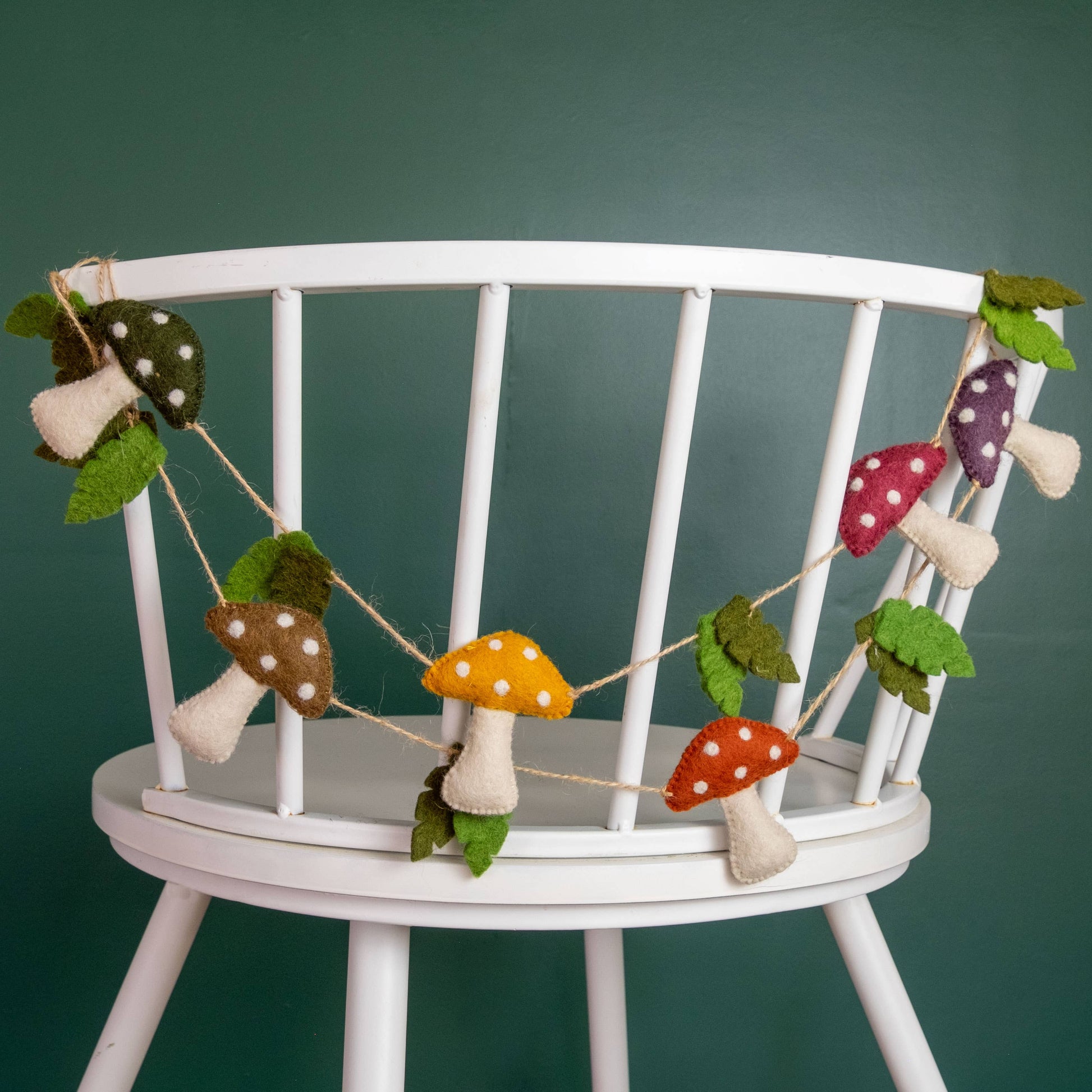 Multicolor mushroomgarland on a chair