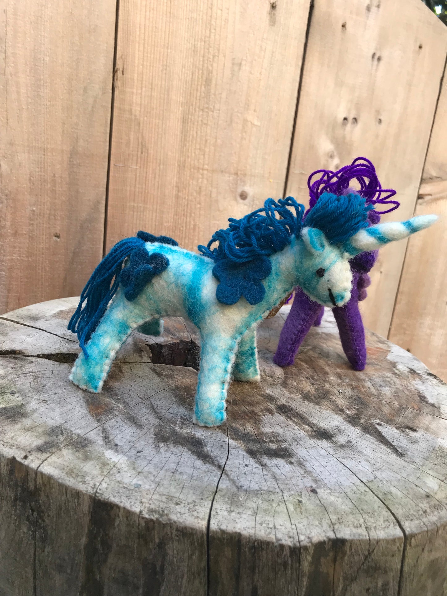 small teal wool felt unicorn