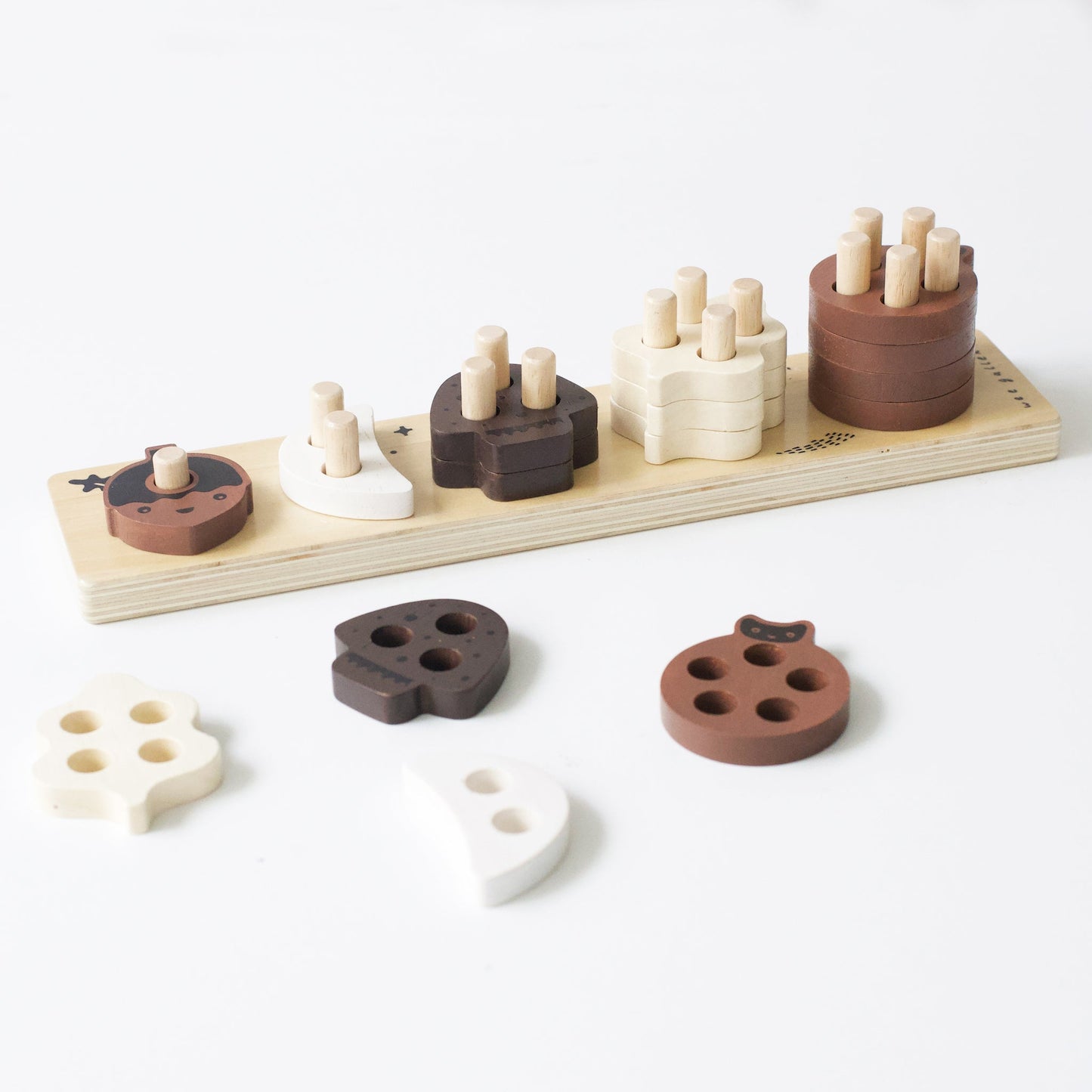 Wooden educational toys on a white background
