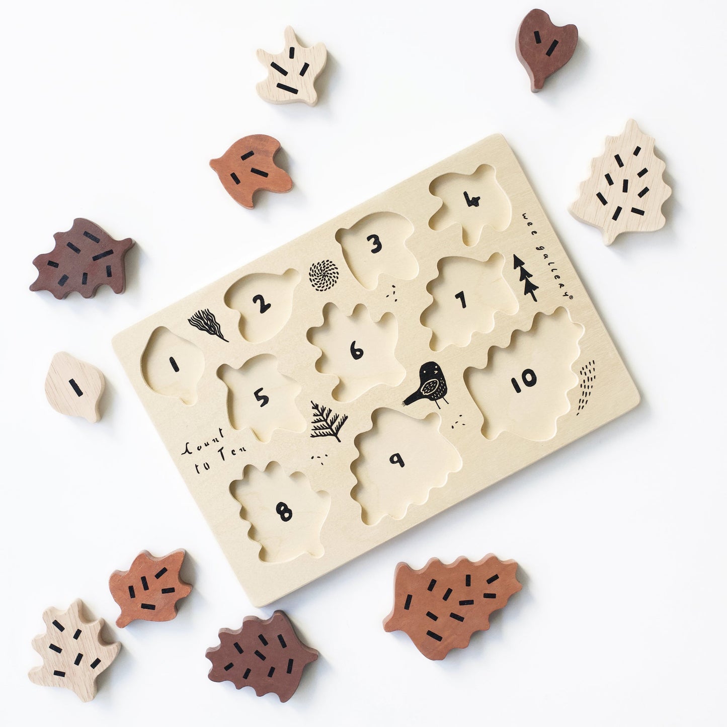 Children's puzzle with numbers and shapes on a white background