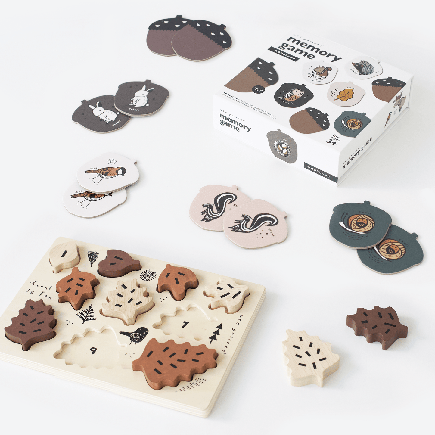 Wooden animal puzzle and memory game set on a white background