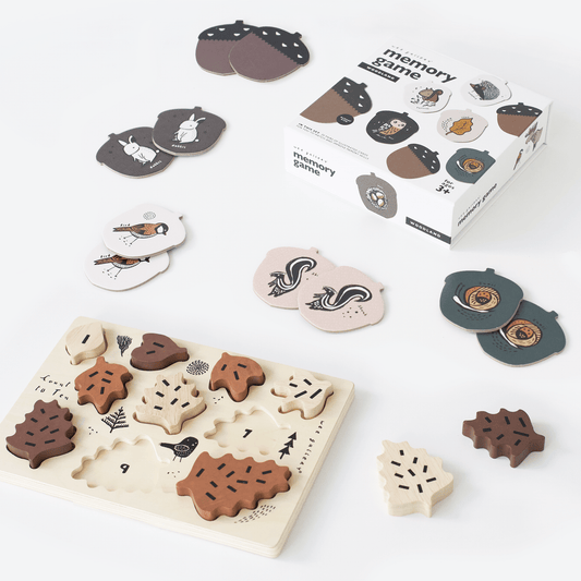 Wooden animal puzzle and memory game set on a white background