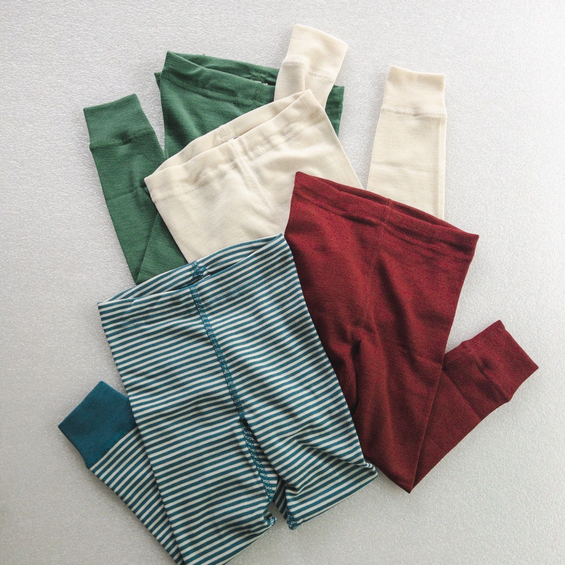 Wool silk legging green, dark raspberry, natural, and blue stripe