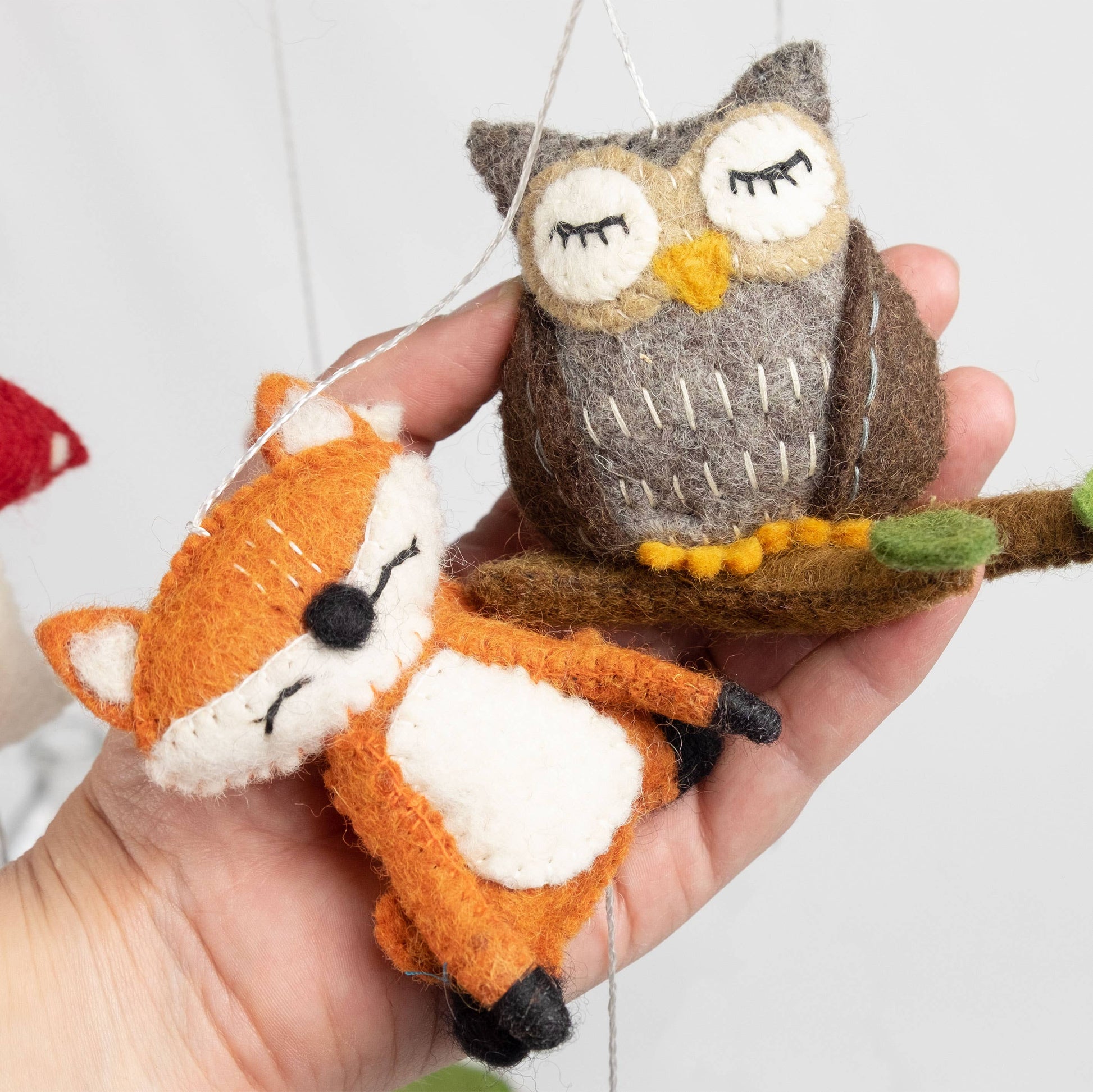 owl and fox figures from felt forest mobile