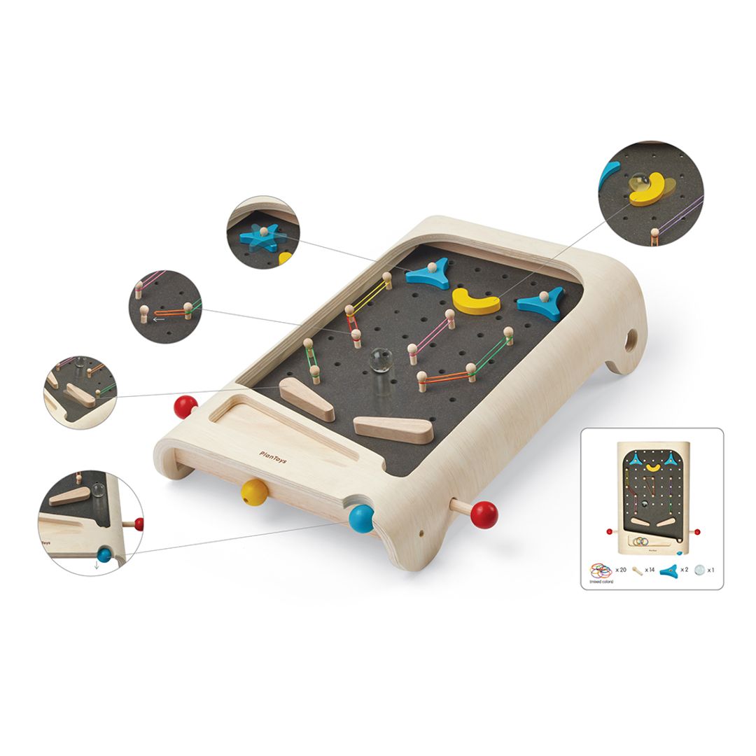 Child Playing Pinball Set by Plan Toys