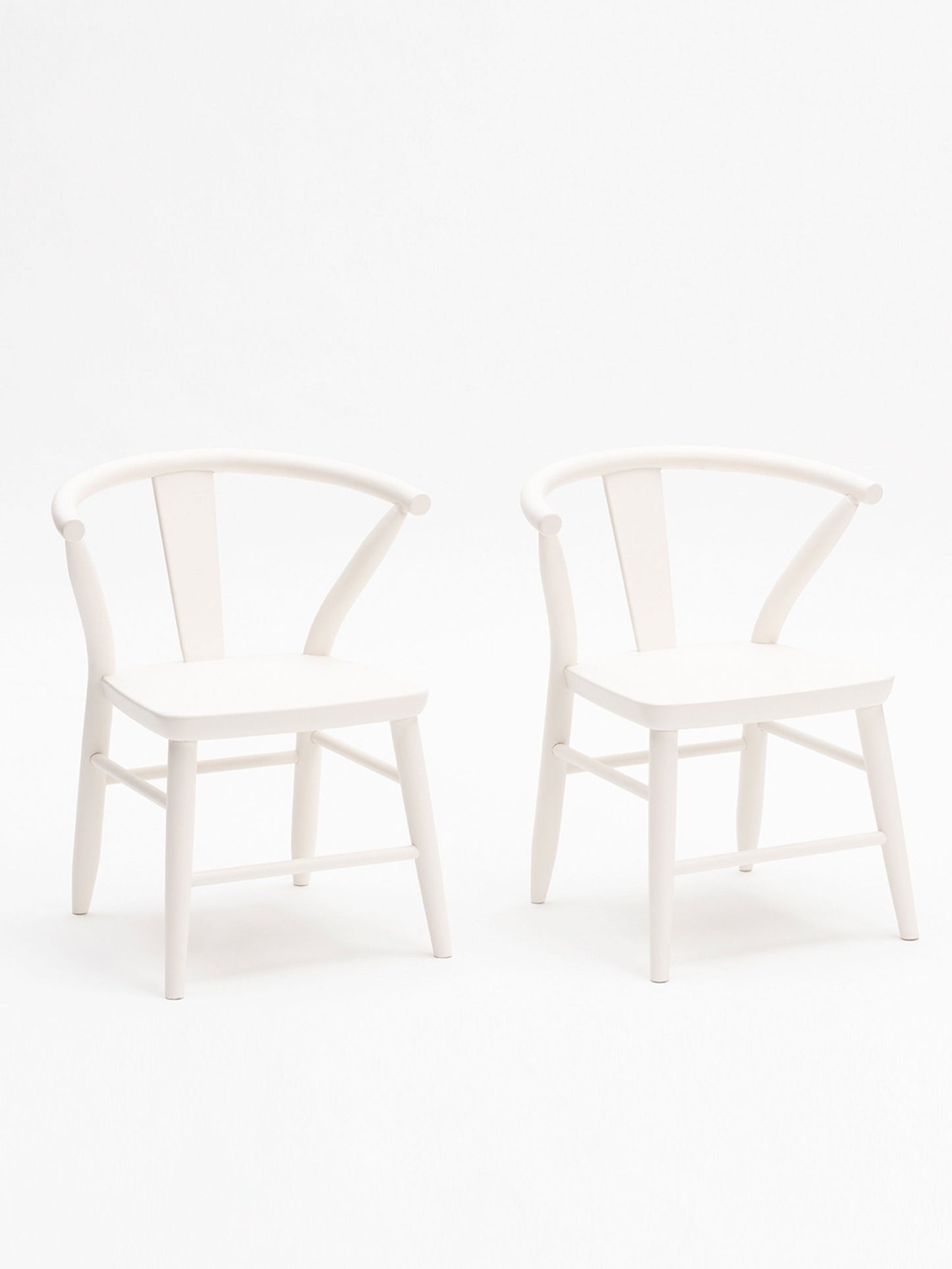 White crescent chairs by Milton and Goose