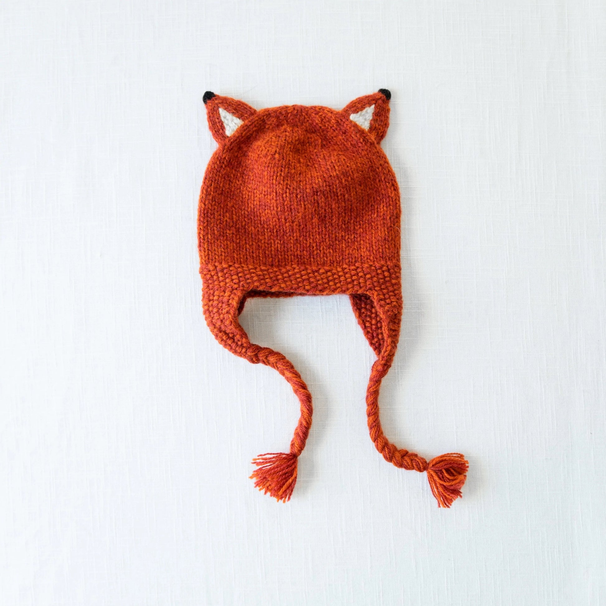 Wool fox hat flat lay