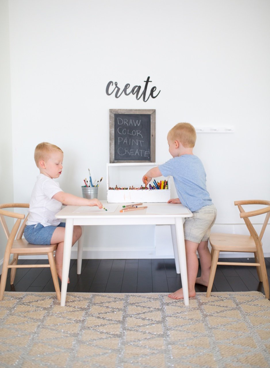 White crescent table by Milton and Goose in playroom