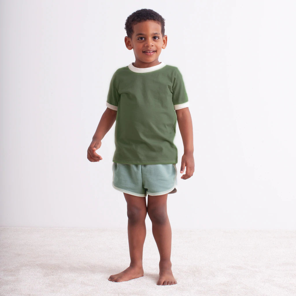 Kid wearing organic short sleeve tee and shorts by Winter Water Factory