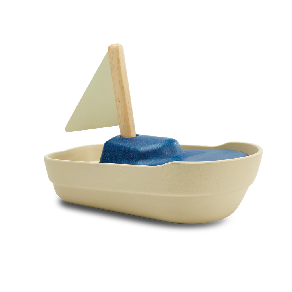 Sailboat from plan toys made from natural rubber and rubber wood