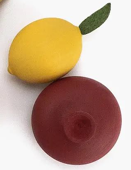 Wooden lemon and pomegranate
