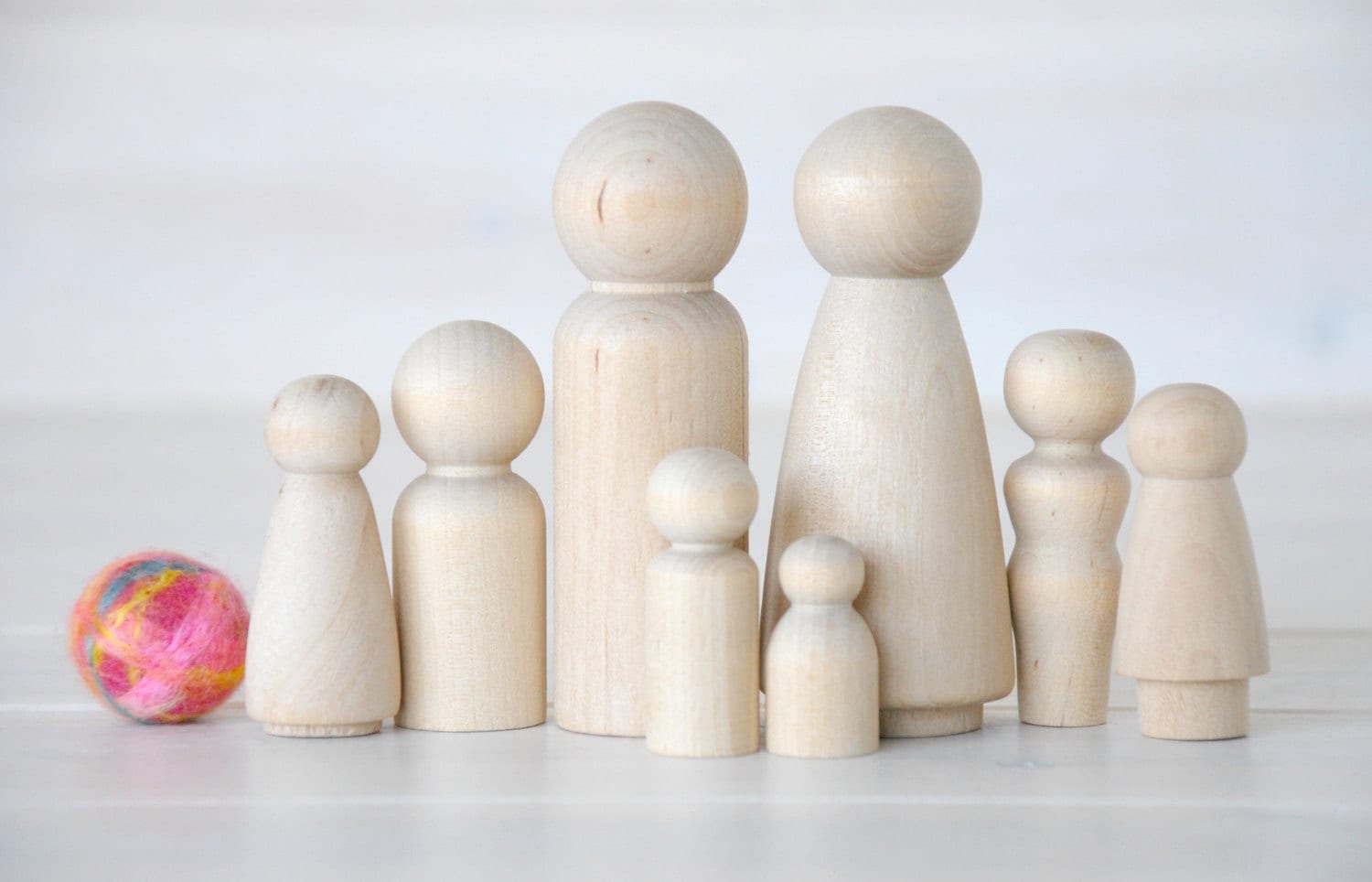 wooden peg people in assorted sizes