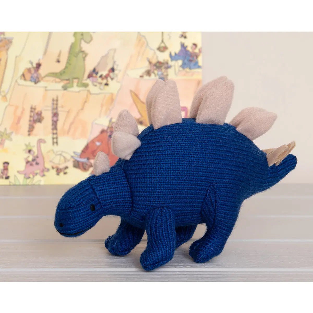Blue Stegosaurus knitted rattle