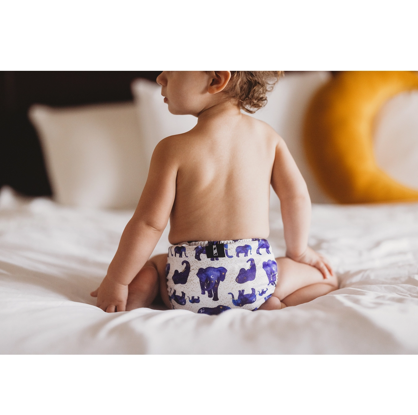 baby in elephant cloth diaper