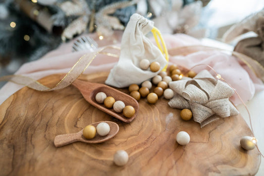 Large wooden scoop with wooden balls