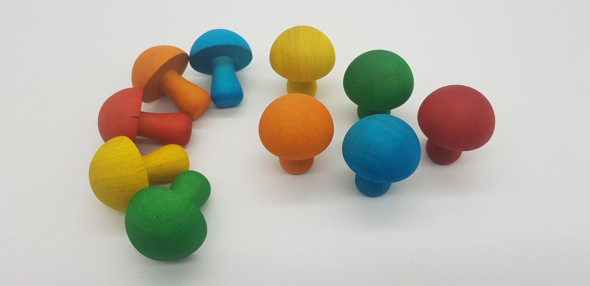 Colored mushrooms by Qtoys