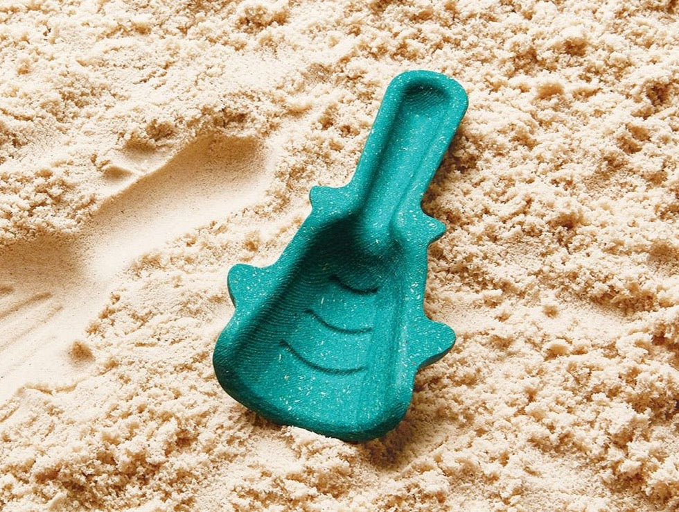 blue shovel from sand play set