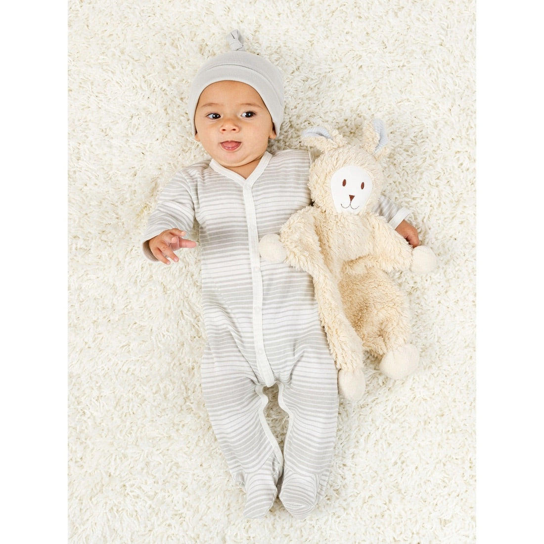 Baby with snuggle bunny with blue ears
