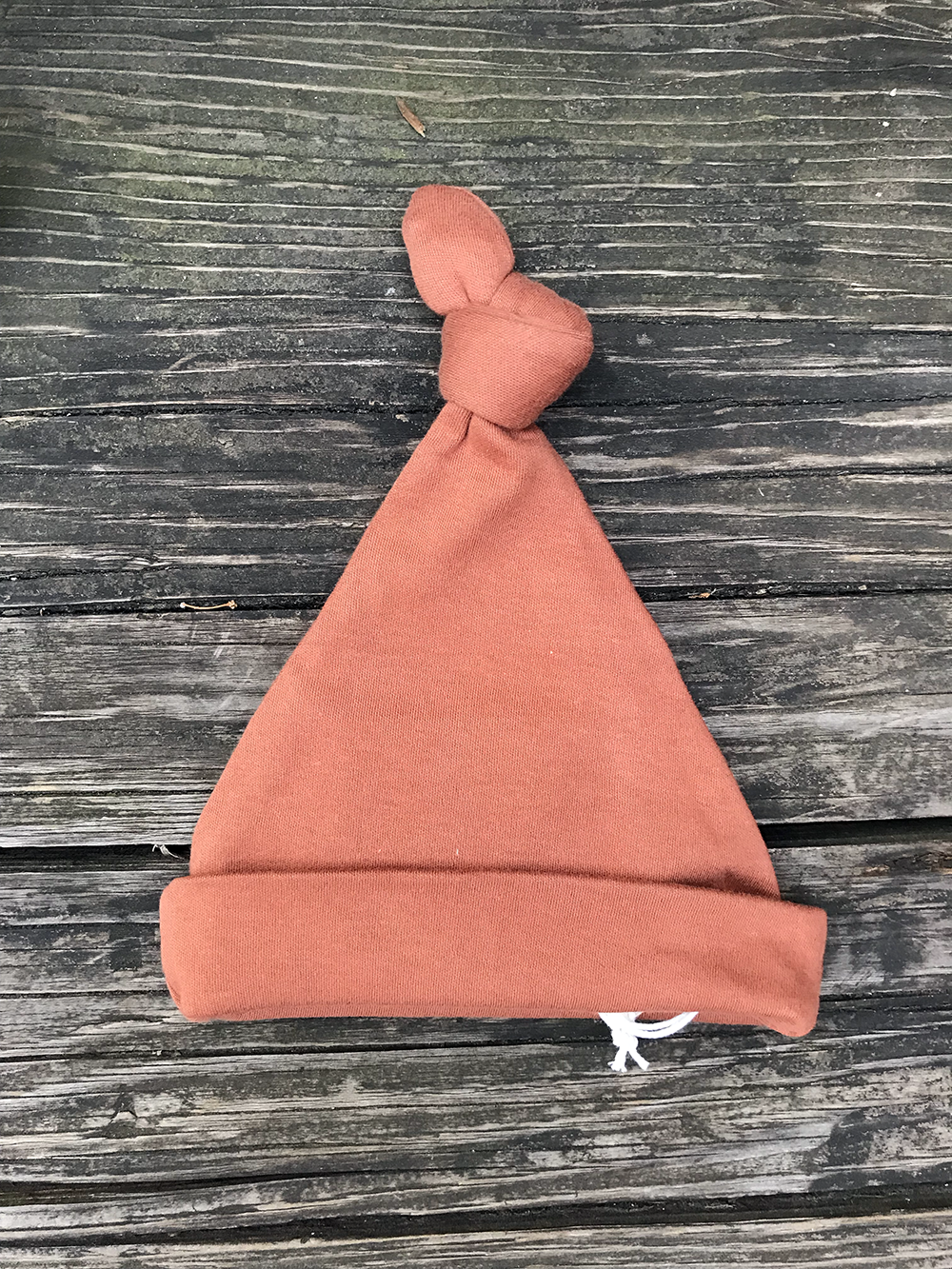 Terracotta baby knot hat